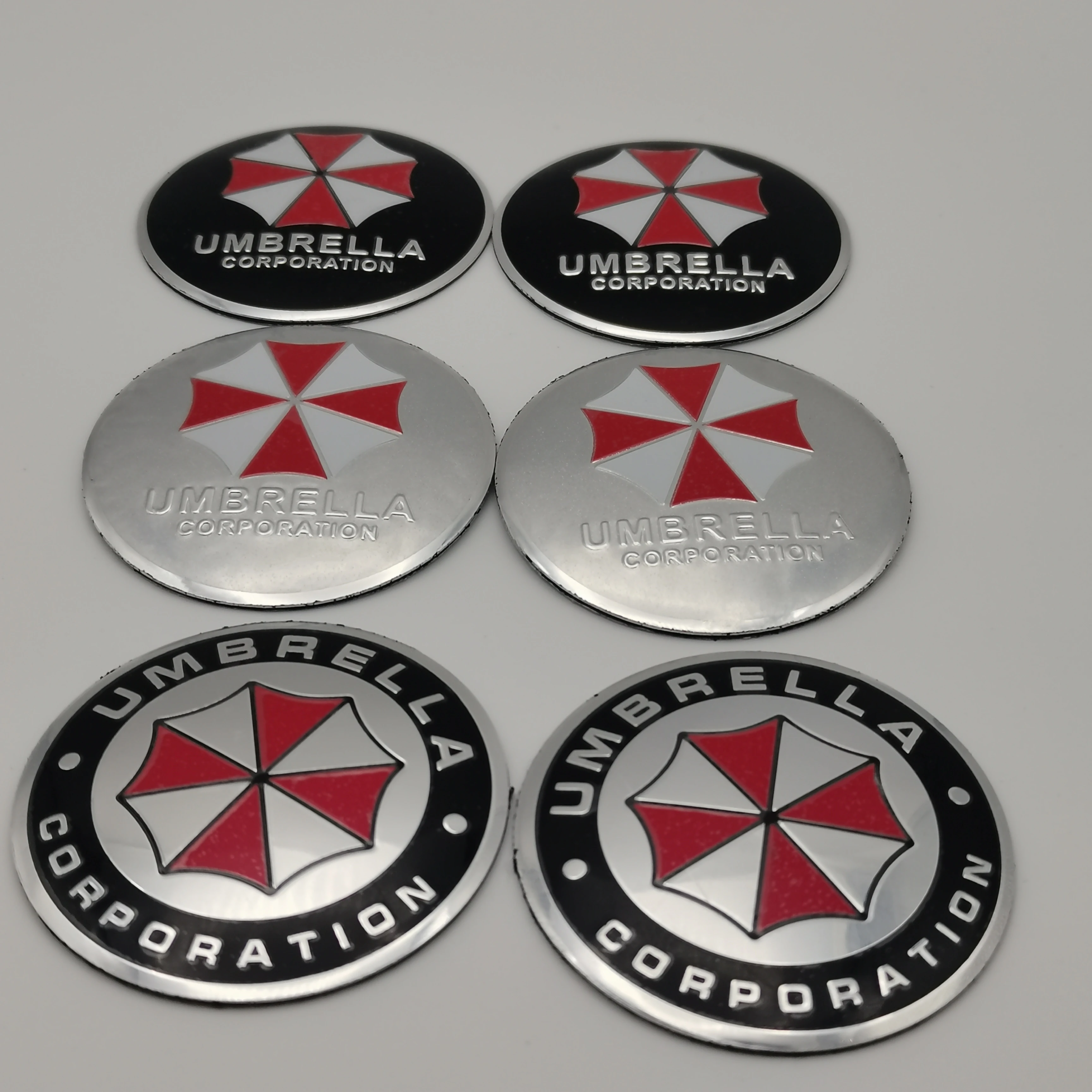 

4pcs * 56mm 60mm 65mm UMBRELLA logo Car Wheel Center Cover Hub Cap Badge Emblem Sticker Car Styling Accessories