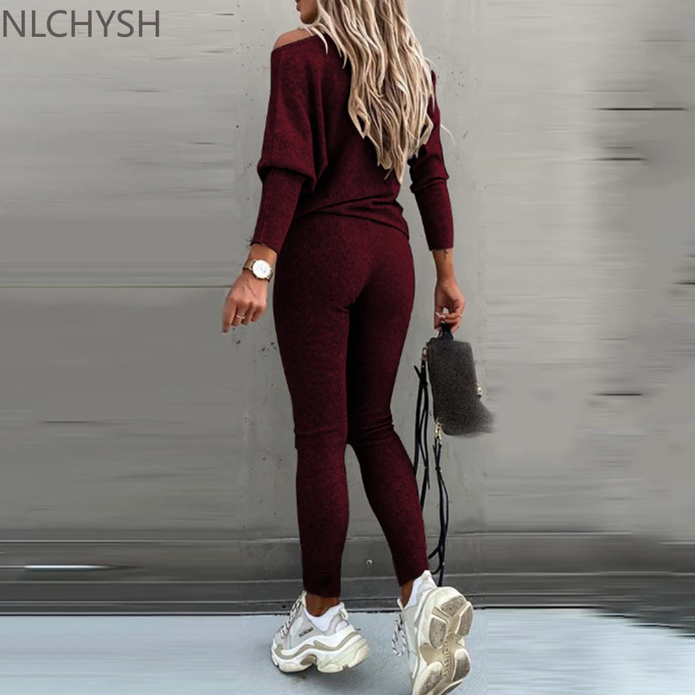 

Spring 2022 Set Women 2 Pieces Solid Color Fashion Skew Shoulder Long Sleeve Loose Sports Trousers Long Tight Pants Tracksuit