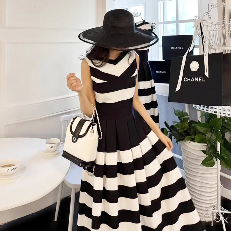 

Clothland Women Fashion Striped Tank Dress O Neck Sleeveless A Line Pleated One Piece Office Wear Midi Dresses Mujer QC645