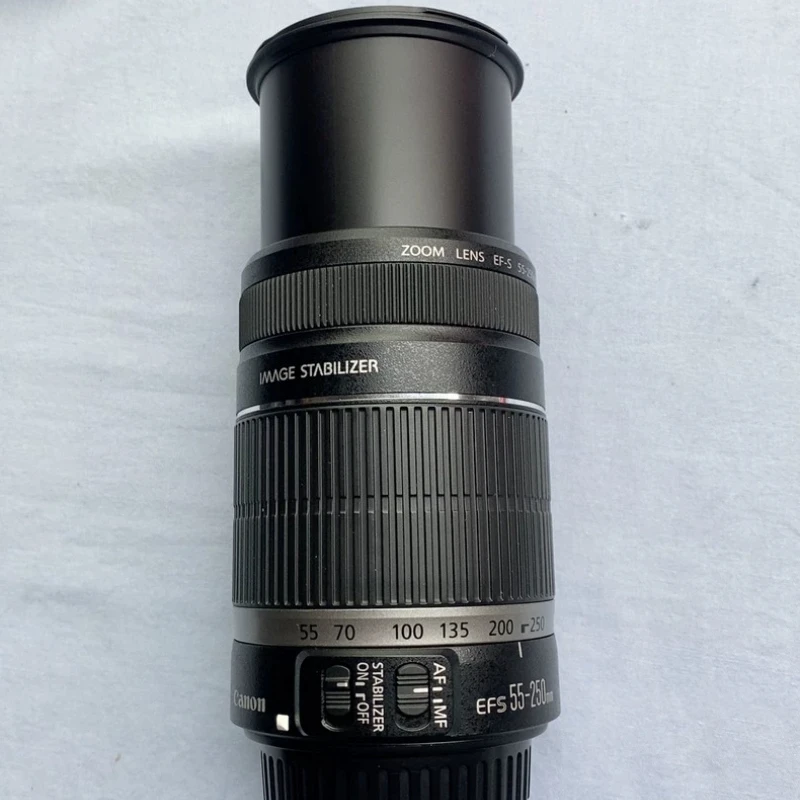 Фото 95% новый оригинальный телеобъектив EF-S 55-250mm F4-5.6 IS с зумом для камер Canon 200D, 80D, 90D, T7, T8i, SL3, APS-C DSLR. №1