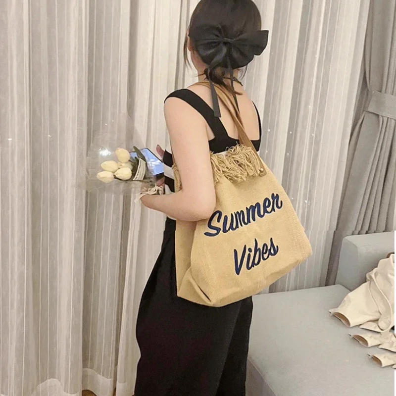 Tote Large Canvas Women's Shoulder Bags Canvas Roomy Fashion Embroidery Letter Tassel Design Versatile Holiday Handbags Works