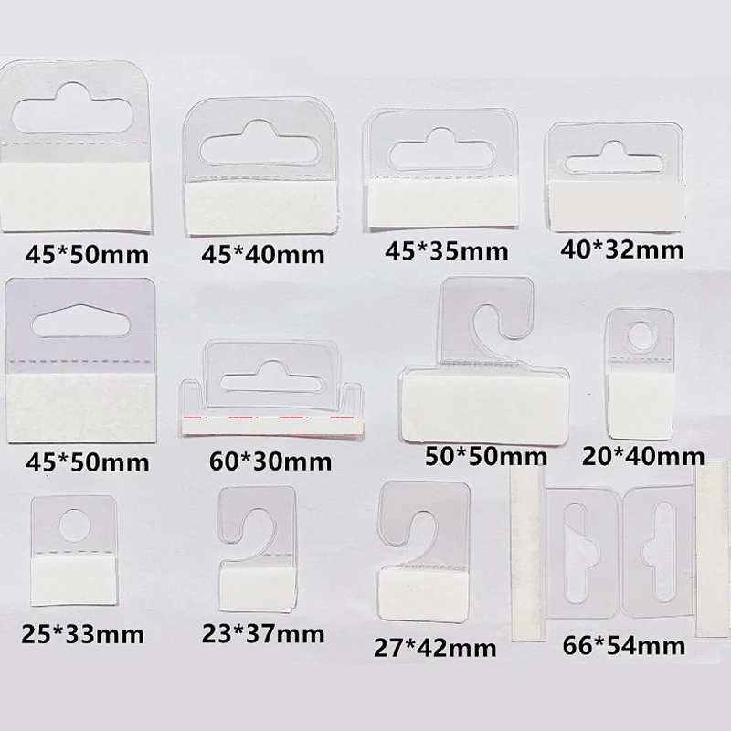100pcs PVC Slot Hole Adhesive Hang Tabs Tags Hook Merchandise Package Box Bag For Store Retail Display Hangers Peghooks Display
