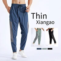 sports pants mens spring and autumn running quick drying breathable wear resistant slim stretch elastic mens casual pants clos