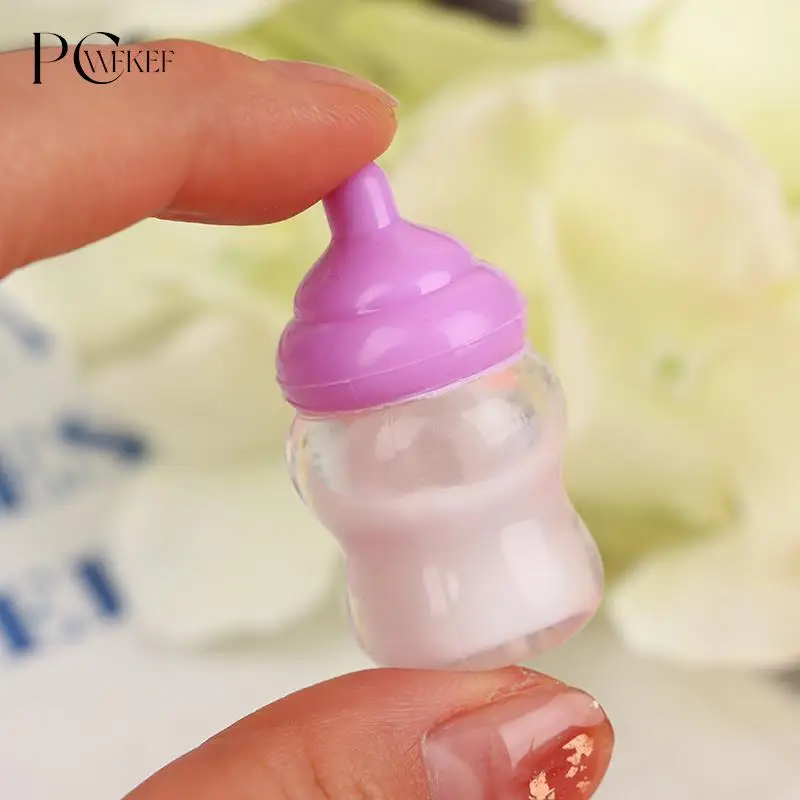 

1Pc Kids Pretend Play Games Toys Mini Nipple Baby Doll Pacifier Bottle For Doll House Feeding DIY Accessories Random Color