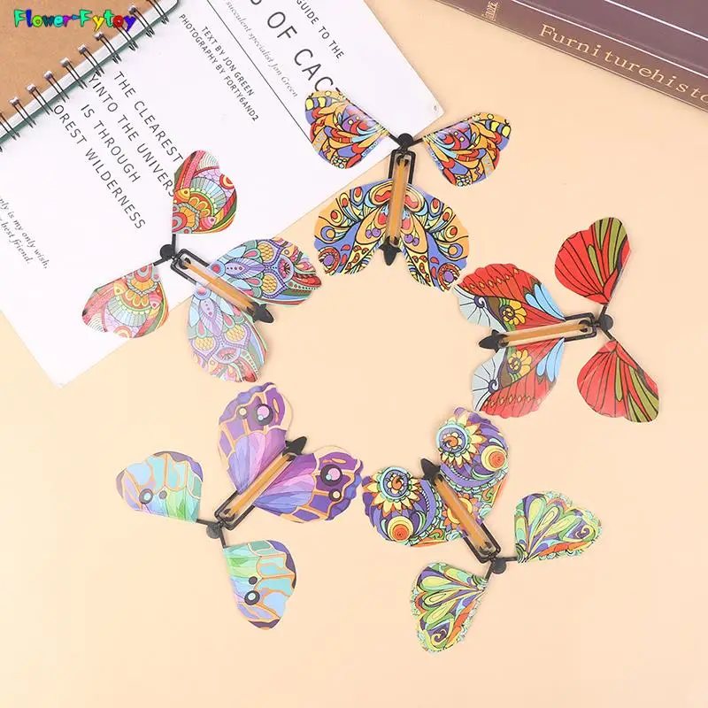 10PCS/SET Magic Wind Up Flying Butterfly Surprise Box Explosion Box in The Book Rubber Band Powered Magic Fairy Flying Toy Gift images - 6