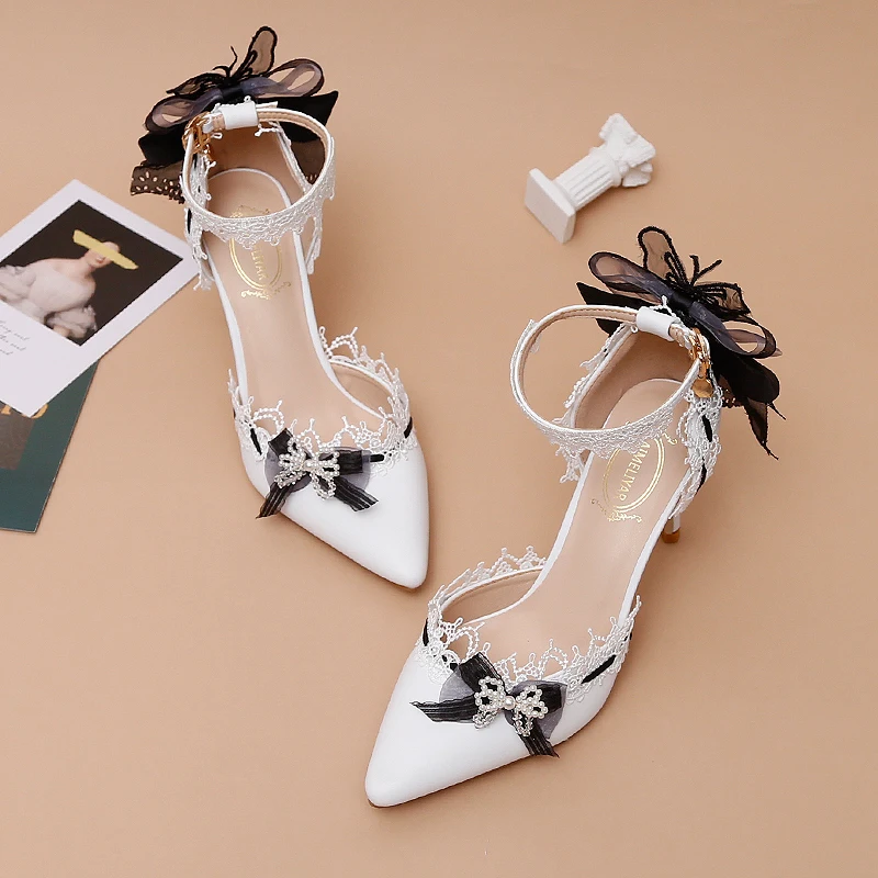 

Thin heels women's lace wrist strap Bow black and white simple hollow sandals