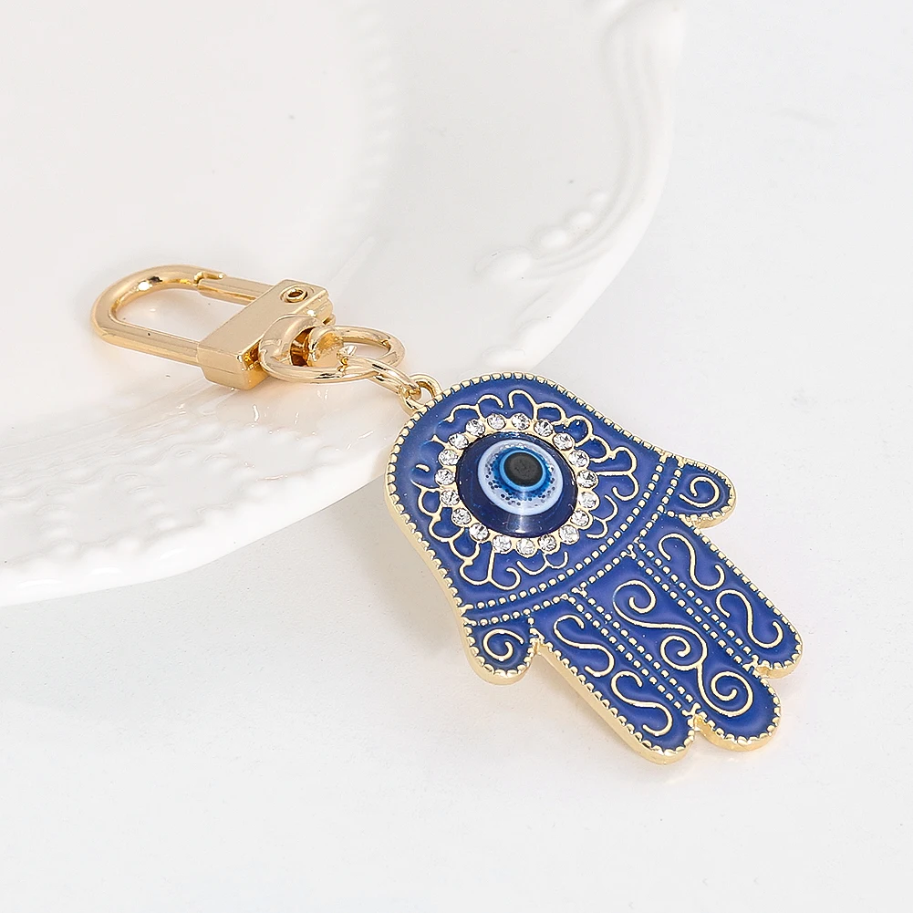 

Fashion Lucky Turkish Blue Evil Eye Muslim Hamsa Fatima Hand Pendant Keychain Inlay Zircon Dangle Key Ring Amulet Jewelry Gifts