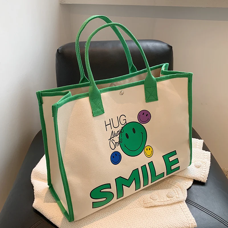 

Large-capacity Handbag Smiley Cartoon Print Messenger Student Canvas Bag Tote Bag Women Casual Bag 2022 New