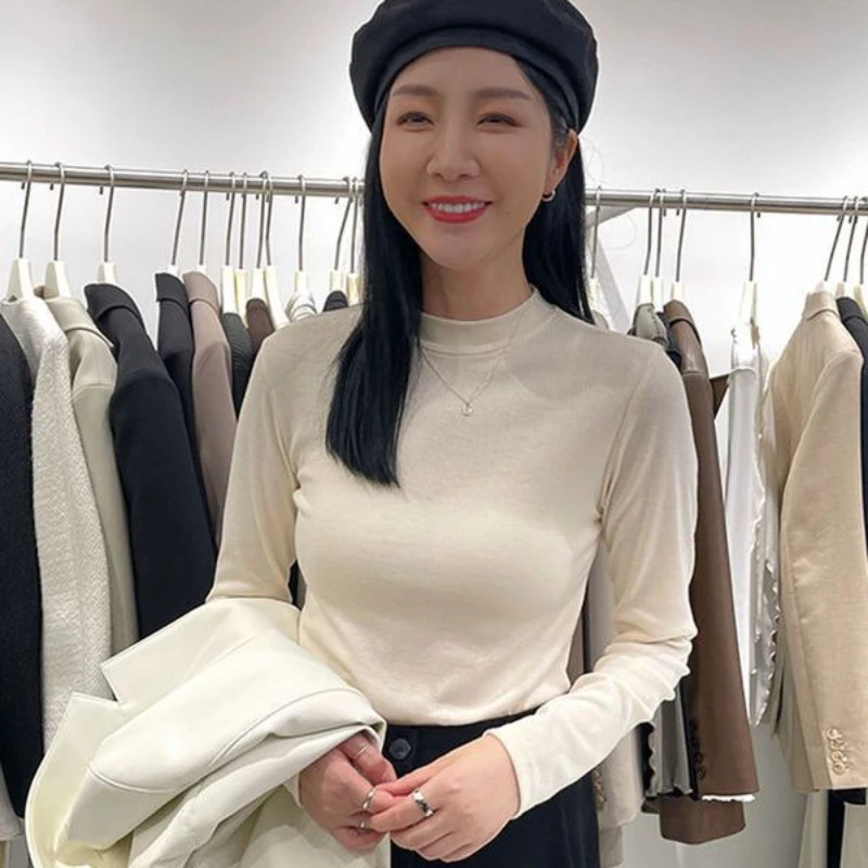 

Женская Однотонная рубашка с длинным рукавом, новинка весны, Женская плиссированная футболка с высоким воротником, нижняя рубашка, облегаю...