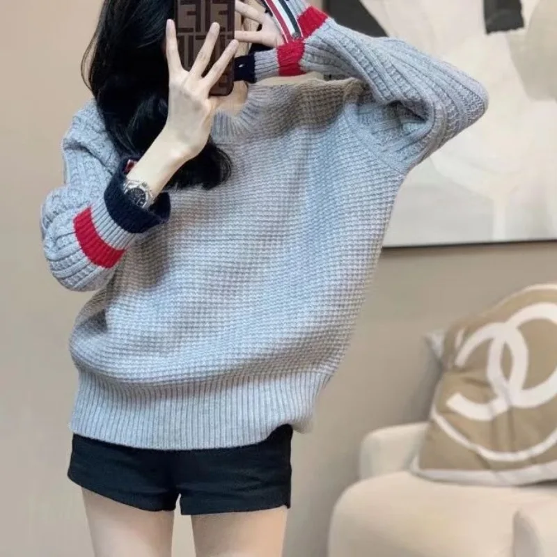 

Autumn and winter new sweater women retro lazy wind loose fashion Joker knit top women