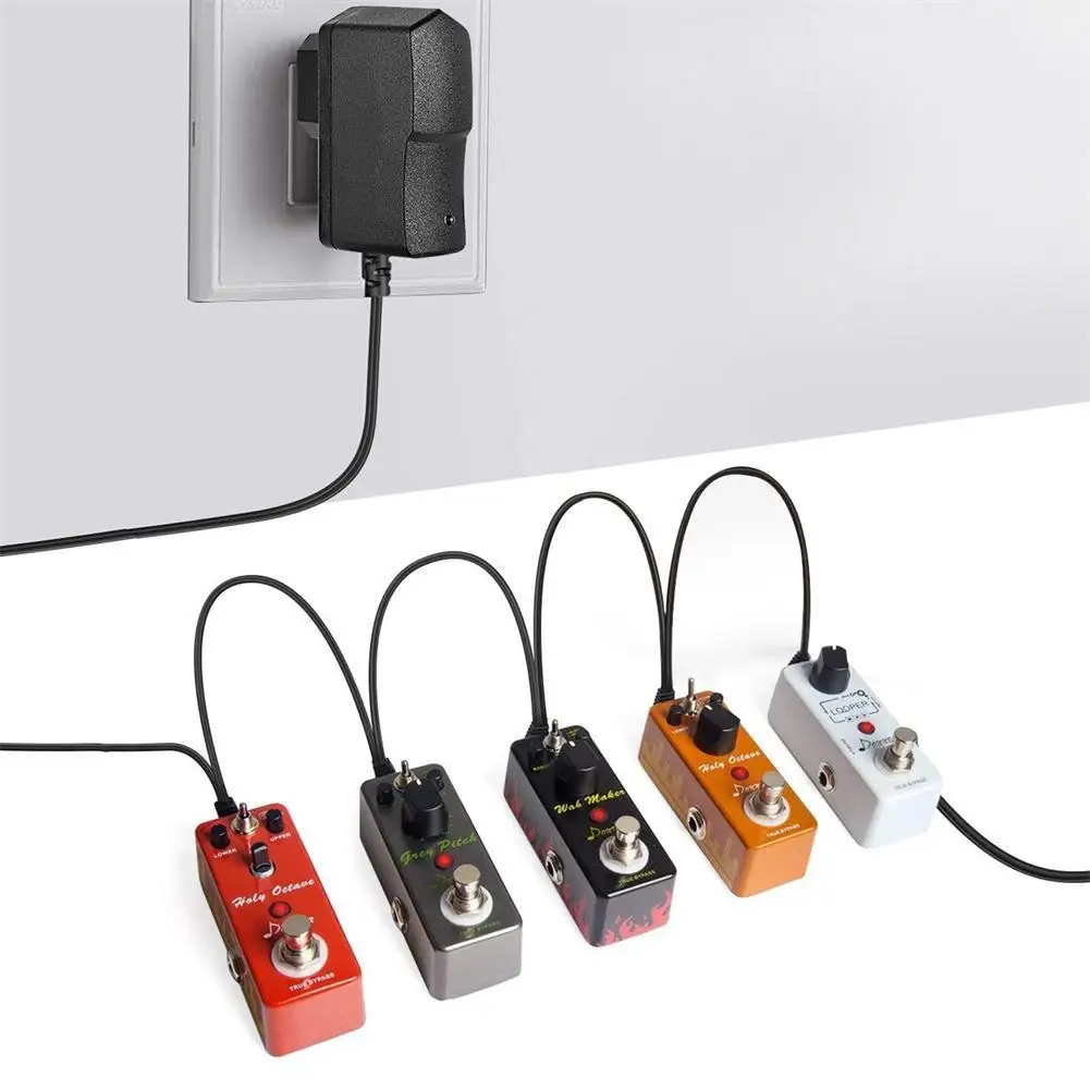 

Guitar Pedal Power Supply Adapter US/EU/AU/UK Plug 9v DC 1A 1000ma Tip Negative 5 Way Daisy Chain Cables For Music Effect Pedals