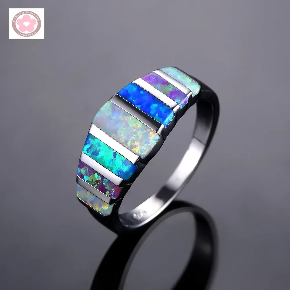 Обручальное кольцо из меди с разноцветным опалом