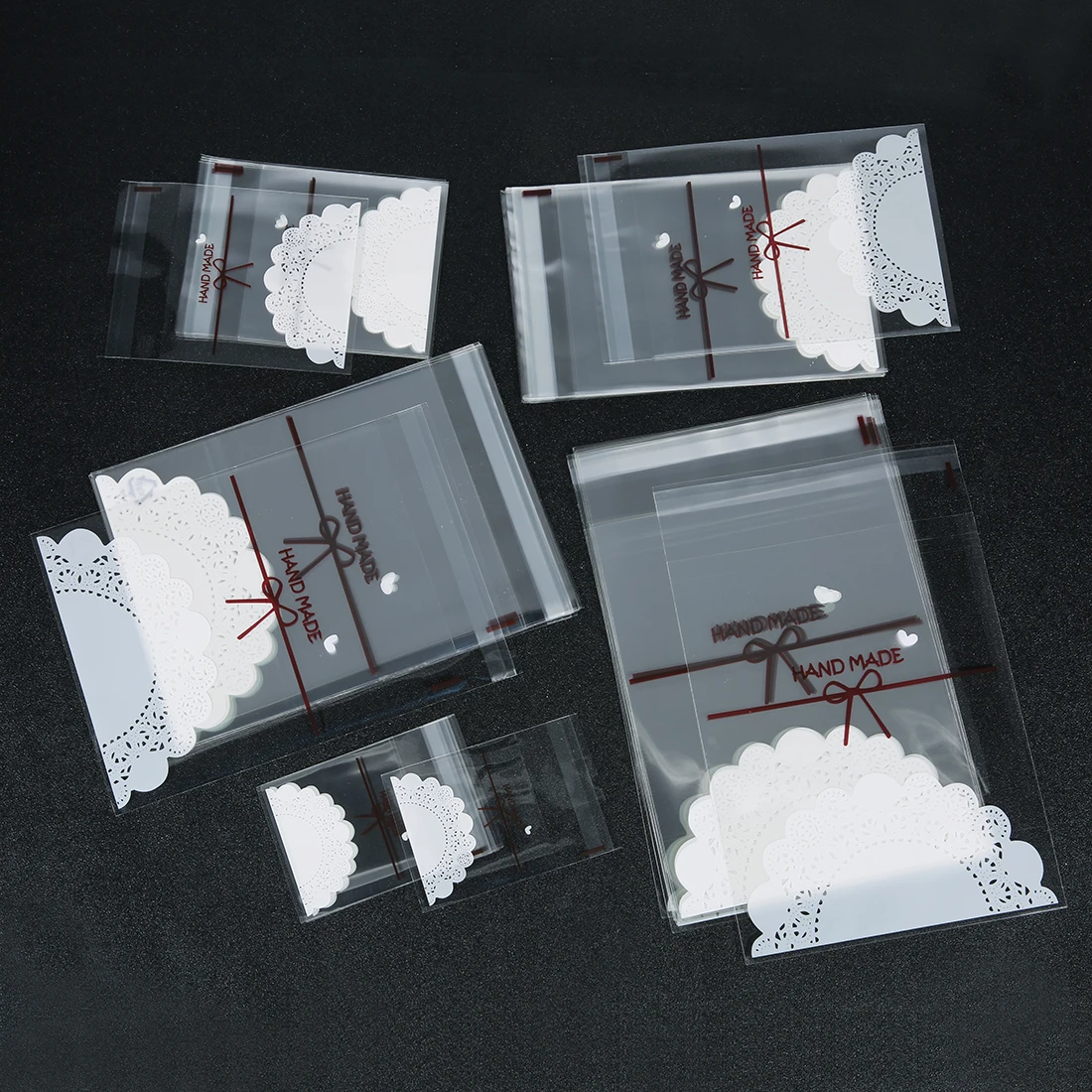 

Прозрачные самозапечатывающиеся пакеты с бантом 100 шт.