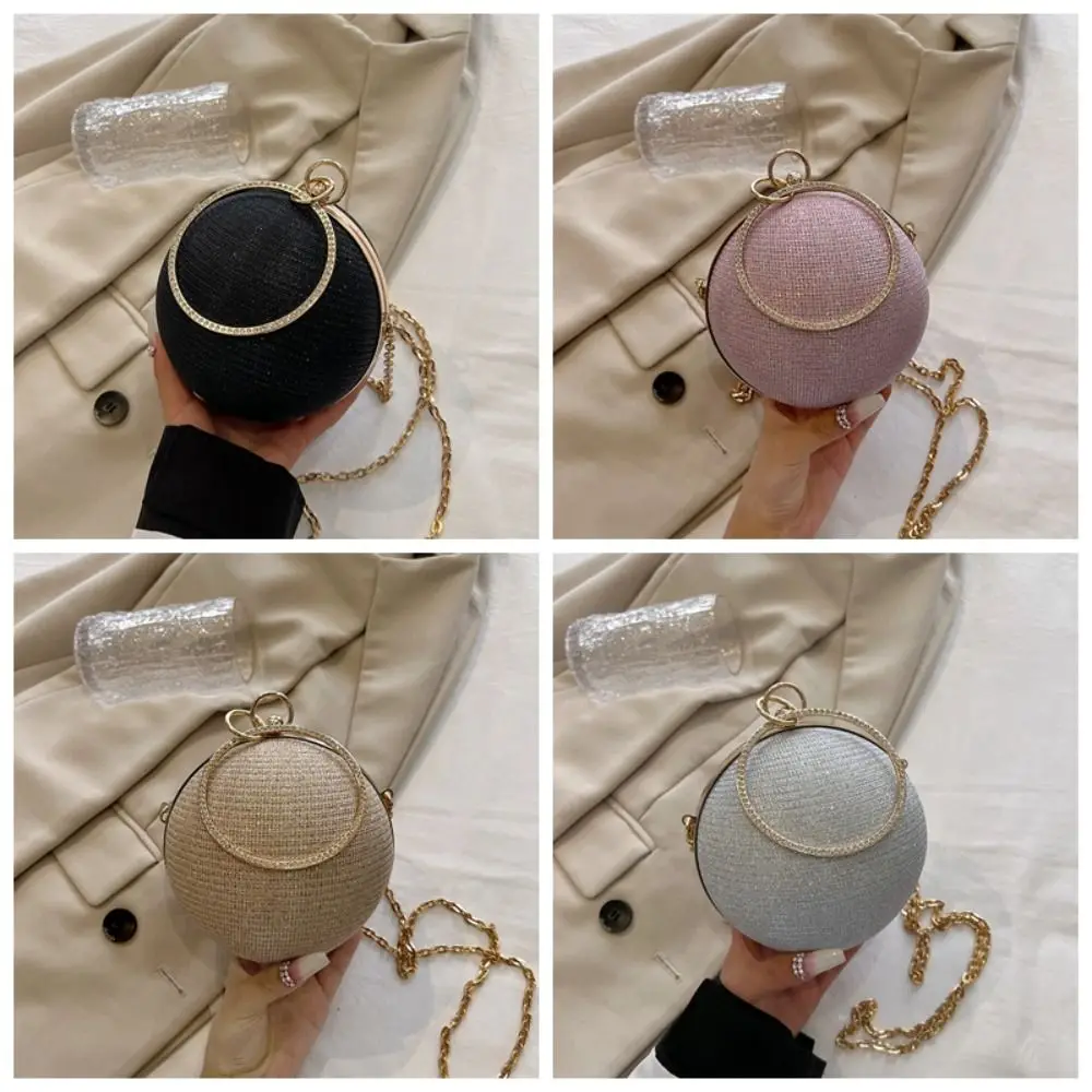 Женская вечерняя сумка-клатч на цепочке с круглой ручкой
