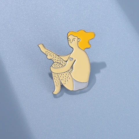 Феминистские броши XioMara