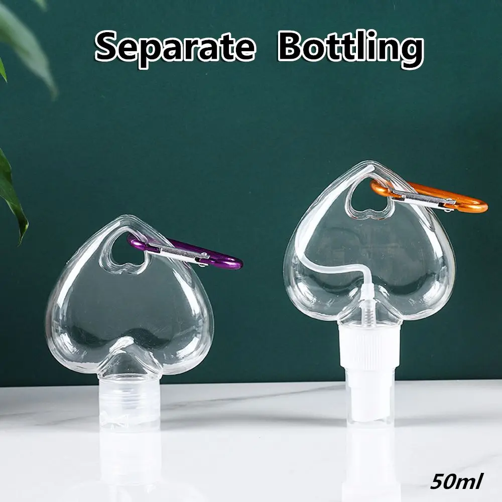 

50ml Refillable Transparent Perfume Alcohol Heart Spray Bottle with Metal Hook Lotion Jar Empty Container Bottle