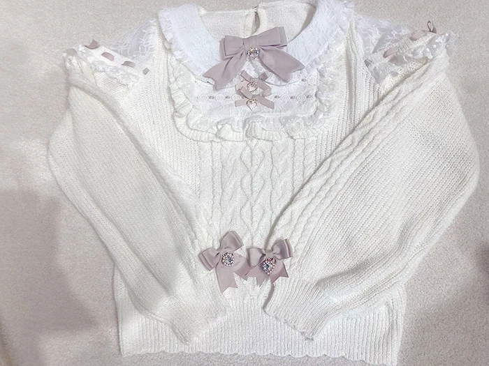 Женский трикотажный свитер с рюшами и длинным рукавом на осень/зиму