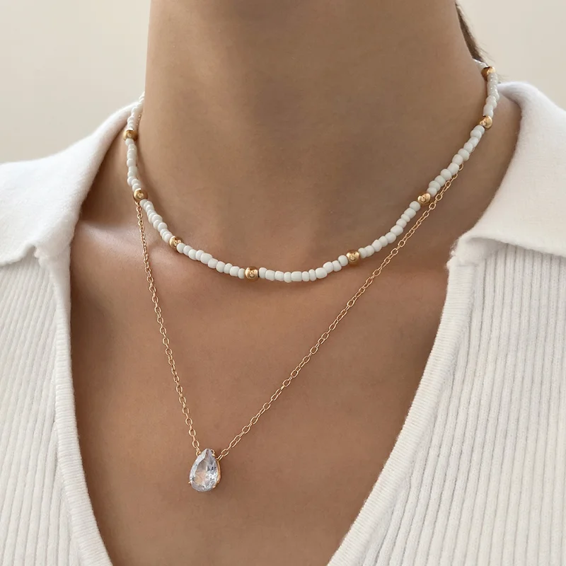 

Simple Double Layer Beaded Necklace for Women Fashion Teardrop Zirconia Cross Pendant Collarbone Chain Jewelry Accessories Gift