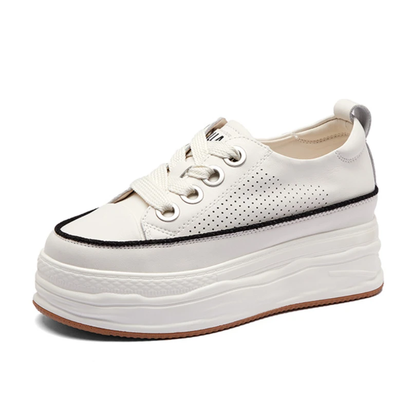 

Женские кроссовки из натуральной кожи, на танкетке 6,5 см