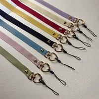 iphone 13 mobile phone lanyard short huawei pure color love buckle pendant xiaomi samsung oppo mobile phone camera key chain