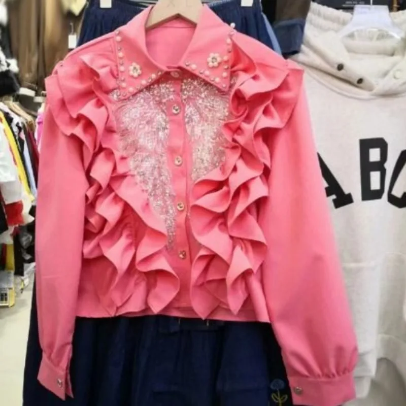 Женская блузка с длинным рукавом воротником лацканами и блестками