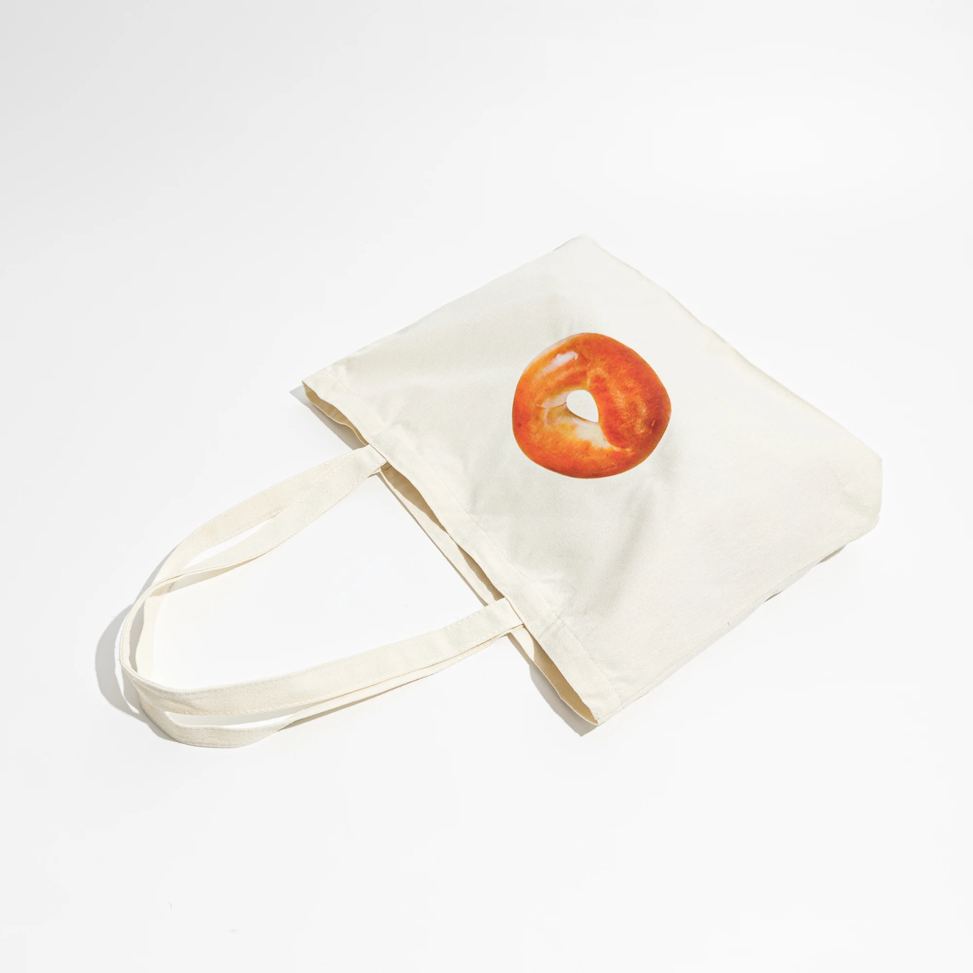 KOKOPEAS Simple Bagel Pattern Canvas Tote Bag Aesthetic For Women Cute Reusable Cloth Cotton Bags for School Shopping Beach