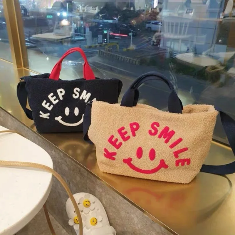 

Корейская плюшевая Сумка-тоут Ins, Милая женская сумка через плечо с принтом улыбающегося лица, теплая тканевая сумка для девочек, Студенческ...