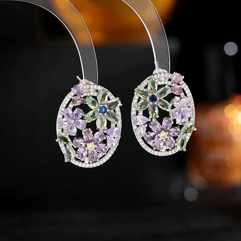 

Женские серьги из серебра 925 пробы с фиолетовыми вставками