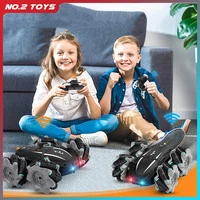 2 4g remote control rc car 360 rotating 4wd drift stunt car high speed climbing off road racing car led lights toy kids gift