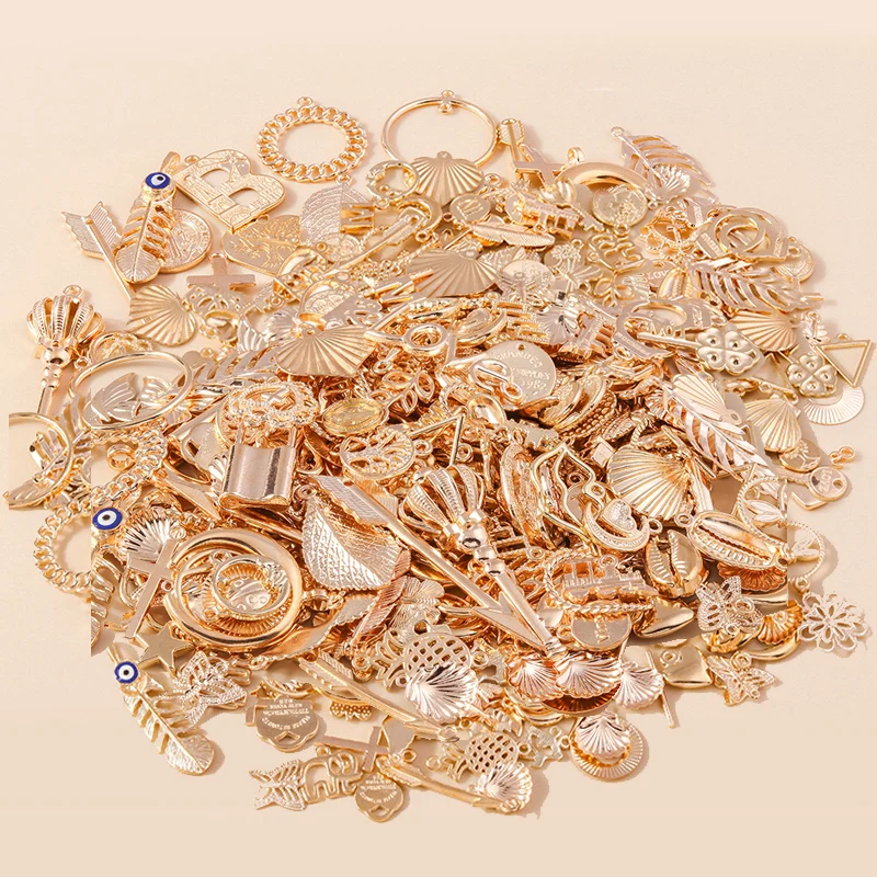 

Mixed 20/100pcs Gold Plated Alloy Charms Flower Animal Star Moon Heart Cross Infinity Pendants for DIY Jewelry Making Wholesale