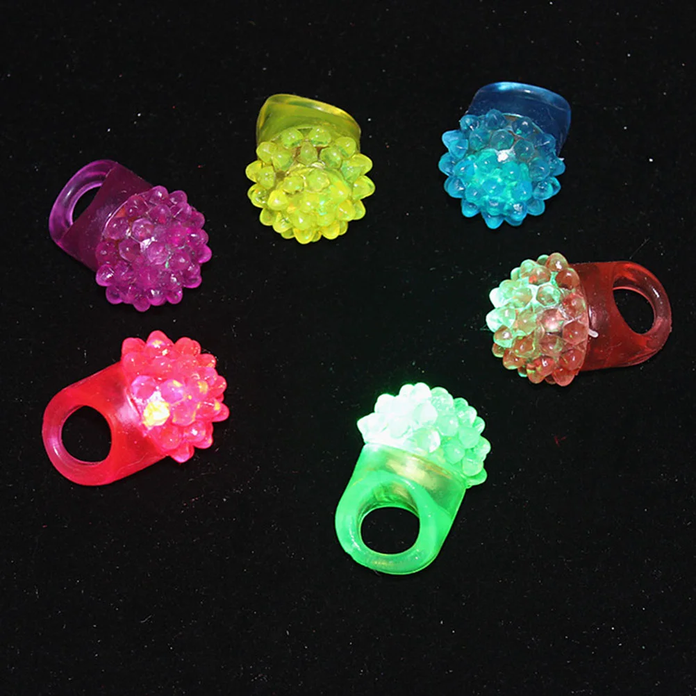 

10 Pcs Strawberry Shaped Rings Silicone Flashing LED Light-up Jelly Bumpy Rings Finger Lights (Random Color)