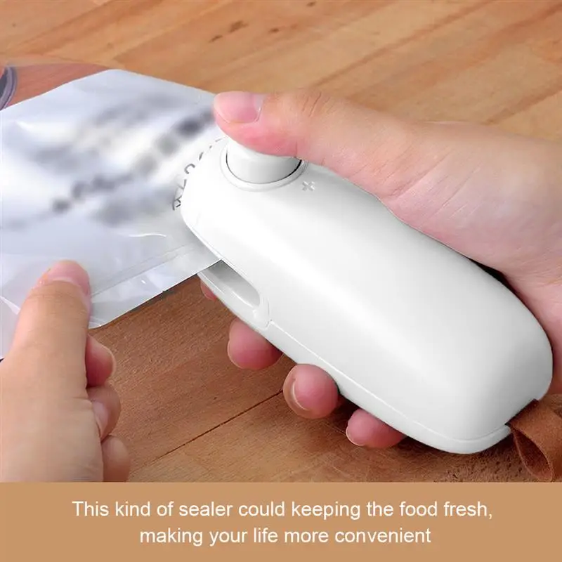 

USB Charging Sealing Machine Hand Pressure Portable Mini Heating Plastic Packaging Machine Handheld Vacuum Food Sealing Device