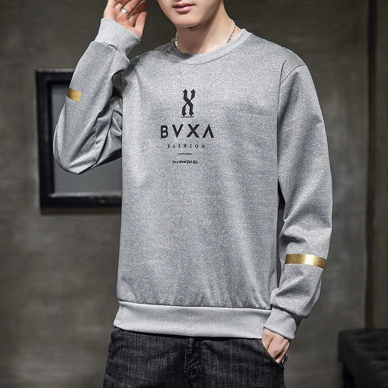 

Men's spring and autumn long sleeved sweater 2023 new Korean fashion print loose shoulder casual round neck sweater men