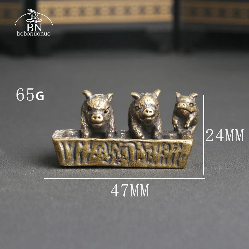 

Медная статуэтка трех поросят