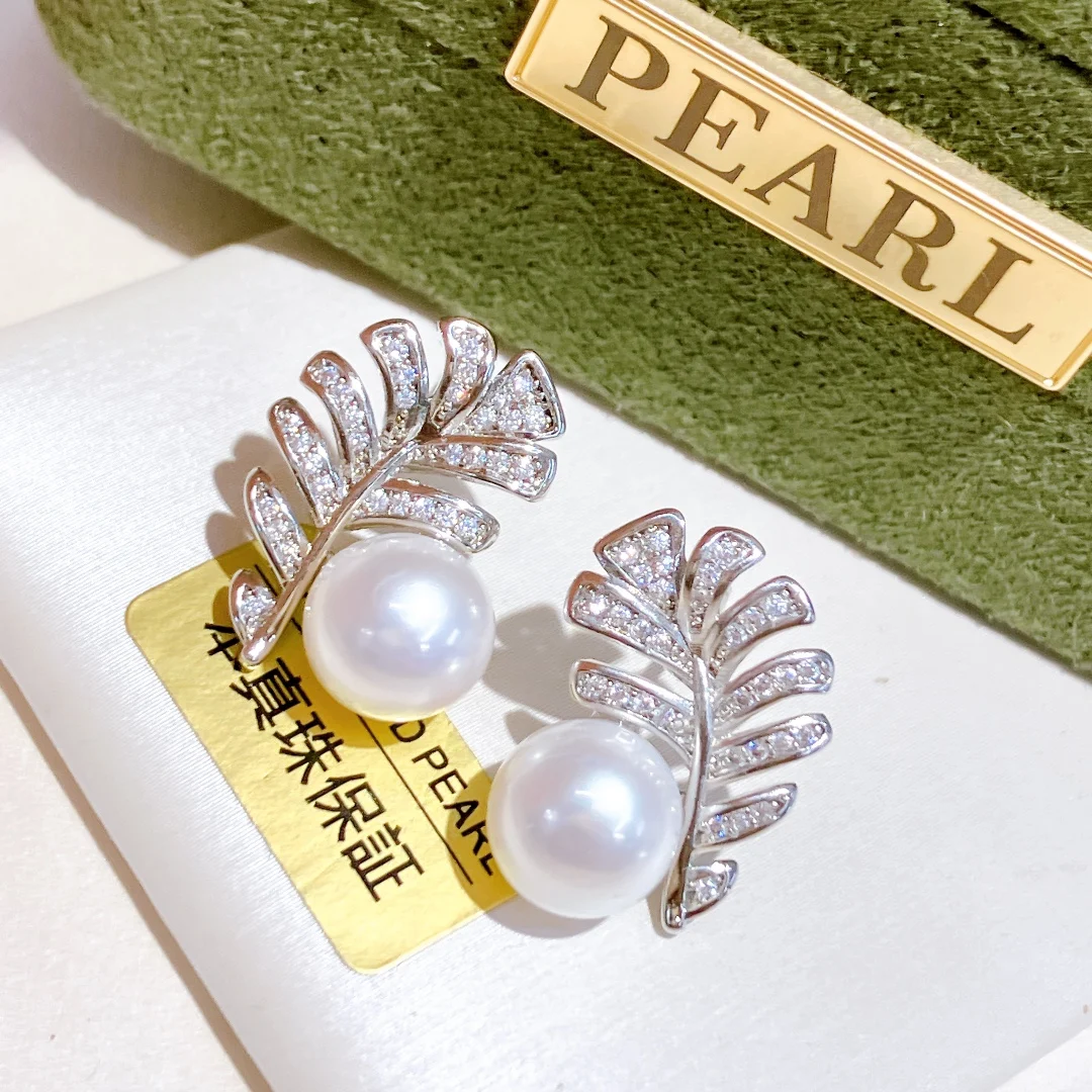 

Женские серьги-гвоздики с искусственным жемчугом