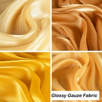 glitter gold shiny satin gauze fabric soft glossy streamer perspective pearlescent dress shirt sewing bright material
