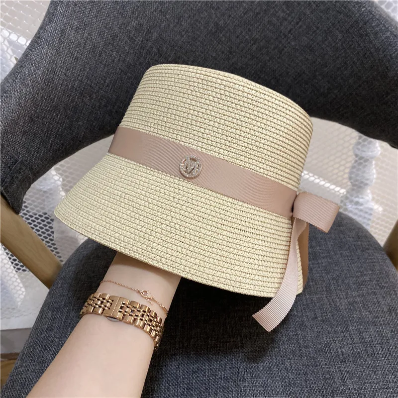 

Hot drilling M standard strap is lovely bowknot straw hat Japanese bucket hat holiday sunbonnet socialite fisherman caps fashion