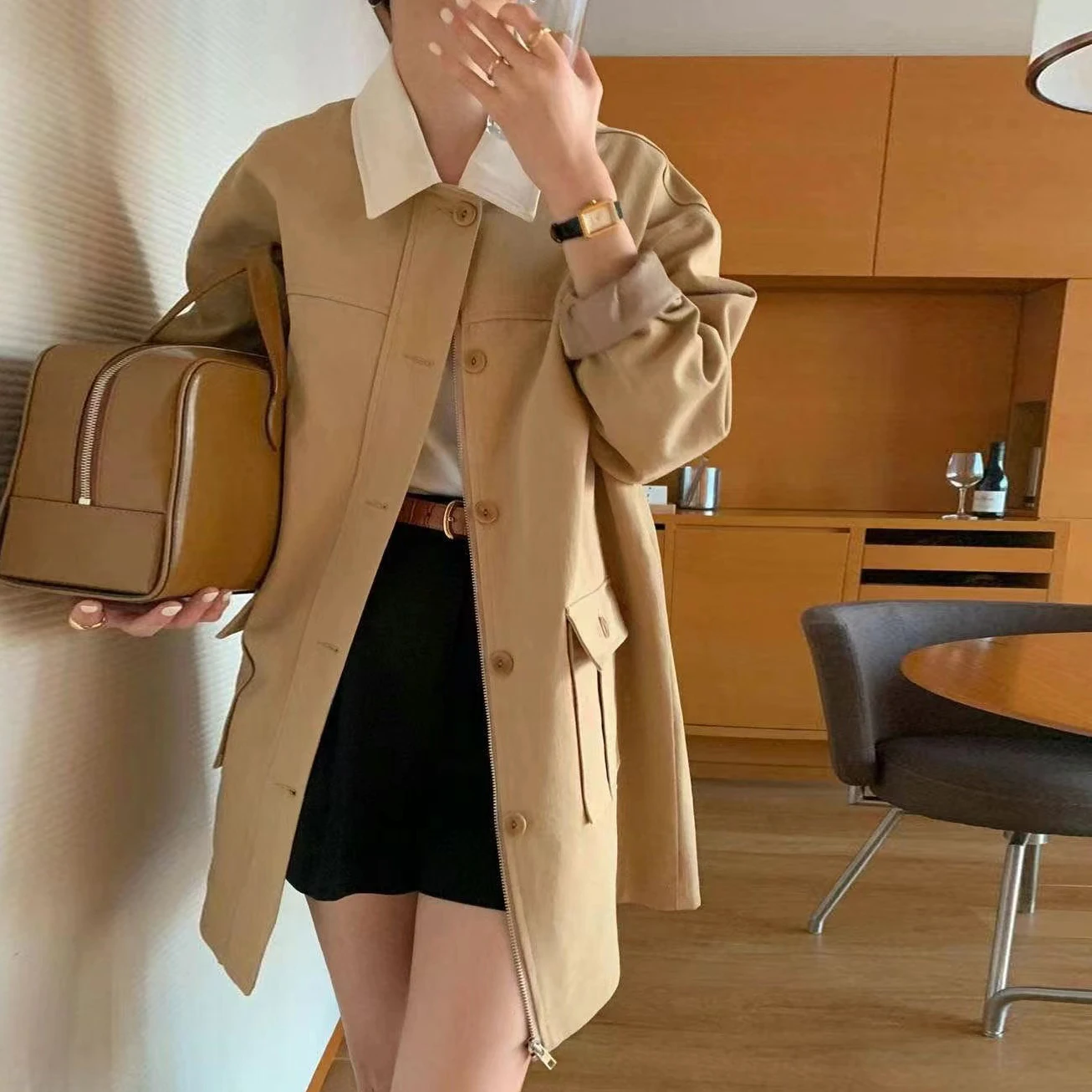 

South Korea's chic small lapel zipper classic bump color restoring ancient ways pockets in the relaxed joker long trench coat