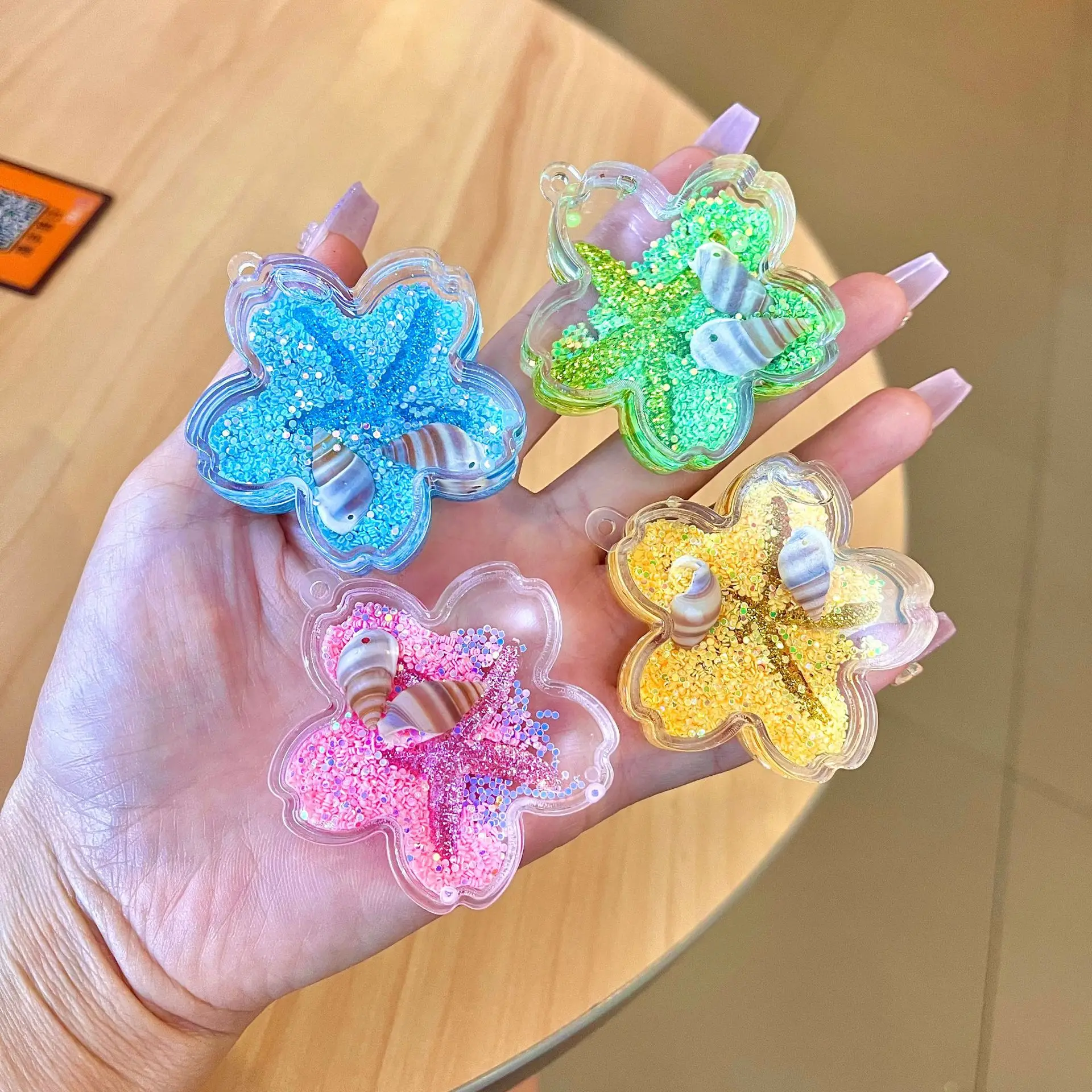 

Colorful Beans Gas Cans Acrylic Luminous Quicksand Bottle Pendant Ornaments Liquid into the Oil Keychain Accessories Wholesale