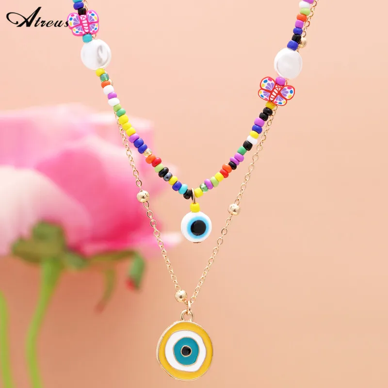 

Gold Plated Multilayer Chain Necklace Women Polymer Clay Random Color Butterfly Pearl Eye Pendant Necklace Glass Beaded Chains