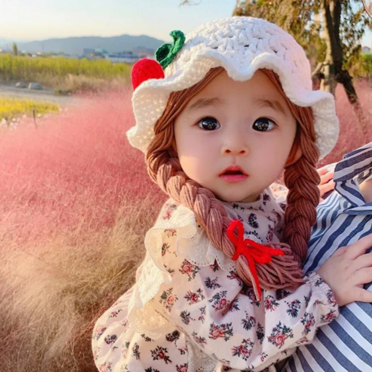 

The new Korean version of the cute cherry braid hat baby knitted hat hand hook twist ear protection newborn fetal hat