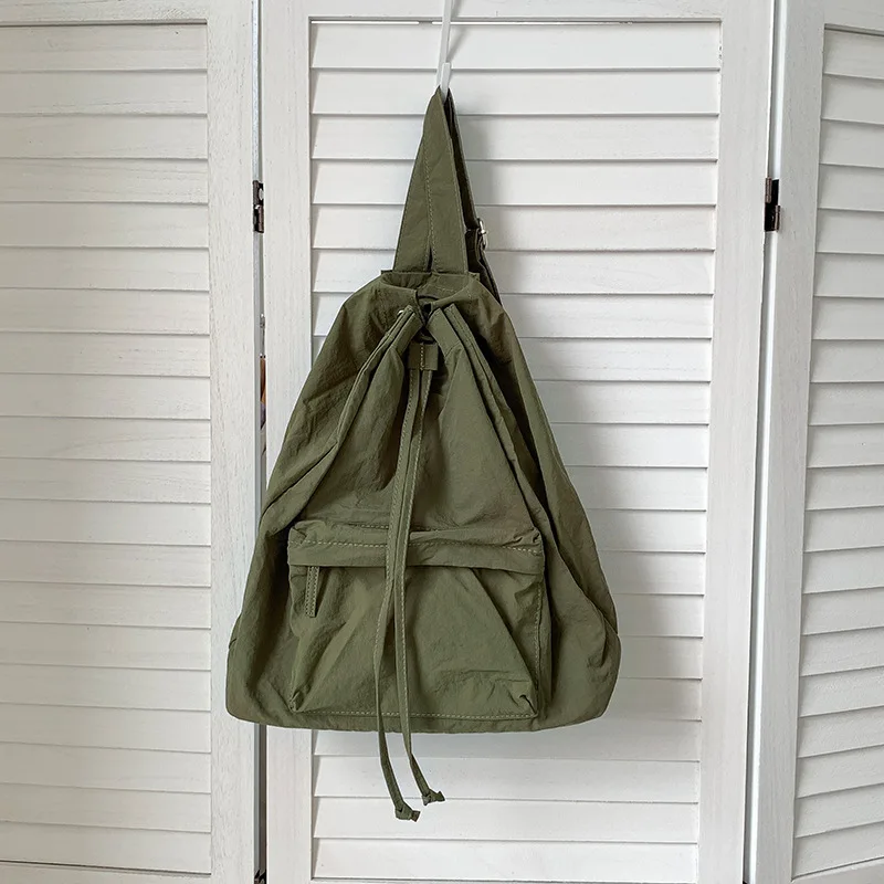 

Minimalism Solid Color Women Backpack Lightweight Nylon Fabric Drawstring Feminina Backpack Causal Designer Book Travel Bag 2023