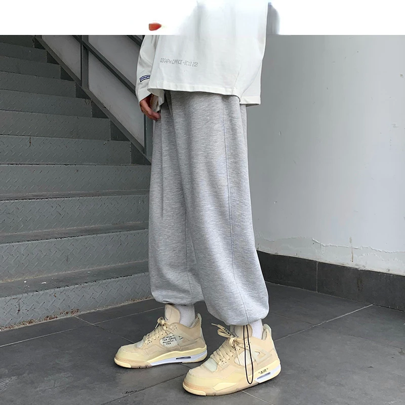 

2023NEW Men Japanese Streetwear Solid Baggy Joggers Pants 2020 Man Korean Fashion Hip Hop Sweatpants Couple Black Trousers 5XL
