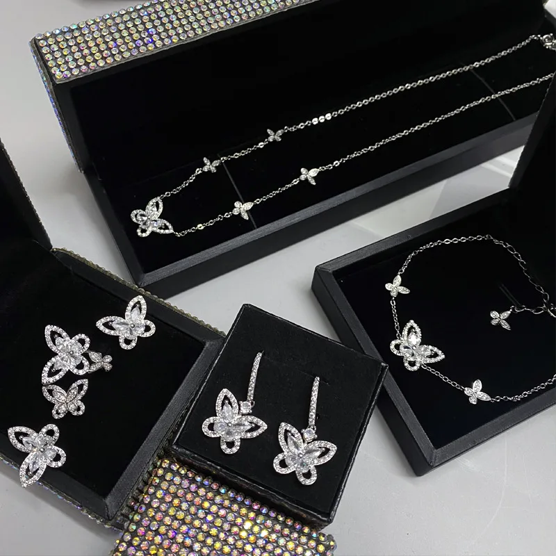 

Новинка 2022, изысканный набор ювелирных изделий в виде бабочки, Роскошный Серебристый микро-набор, белый фотоэлемент/серьги/ожерелье/брасле...