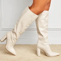 the new one foot walk show in winter 2022 and the same pointed thick heel knee length womens boots