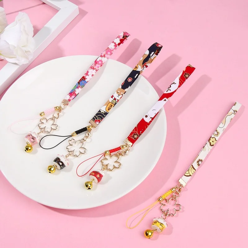 

Lucky Cat Bell Sakura Phone Lanyard Anti-lost Keychain Wrist Rope Phone Strap Pendant Cherry Blossoms Hanging Cord Rope