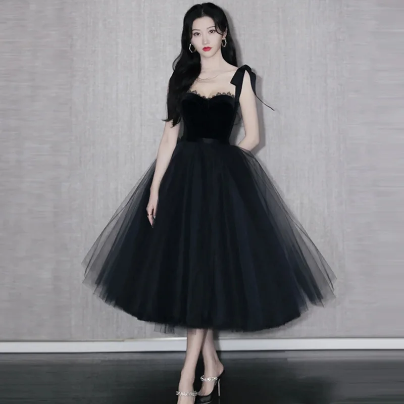 Женское вечернее кружевное платье черное миди без рукавов весна-лето 2024