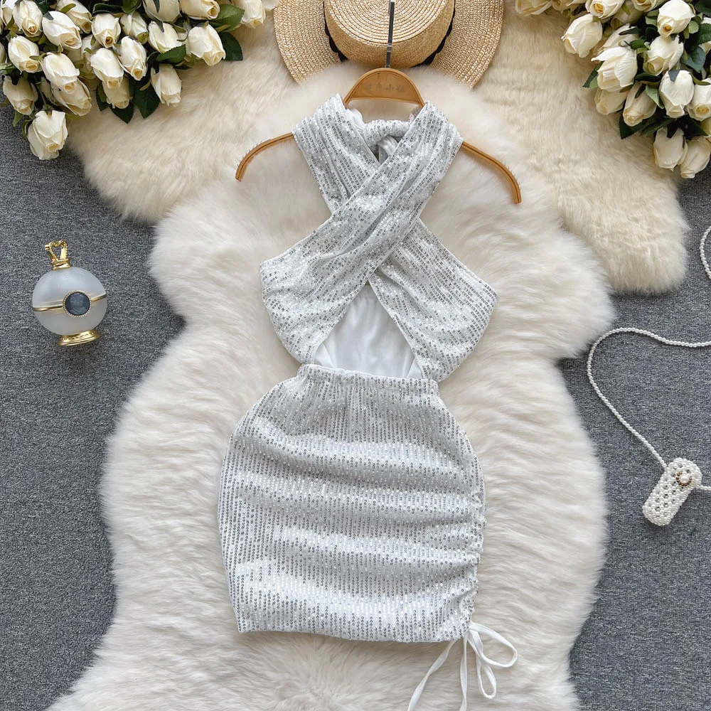 

Europe and the United States Wind Cross Hollow Hanging Neck Hot Girl Drawstring Pleated Slim Package Hip Dress