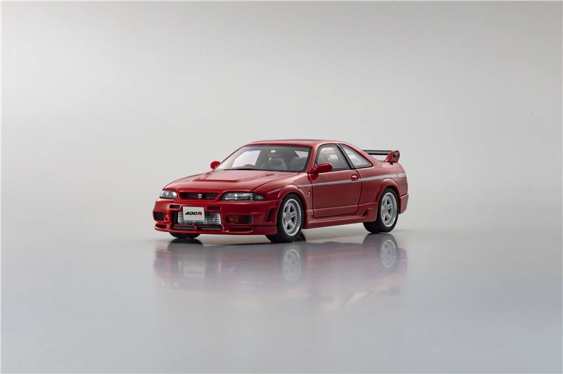 

Модель автомобиля Kyosho 1:43 NISMO 400R (красный) из смолы