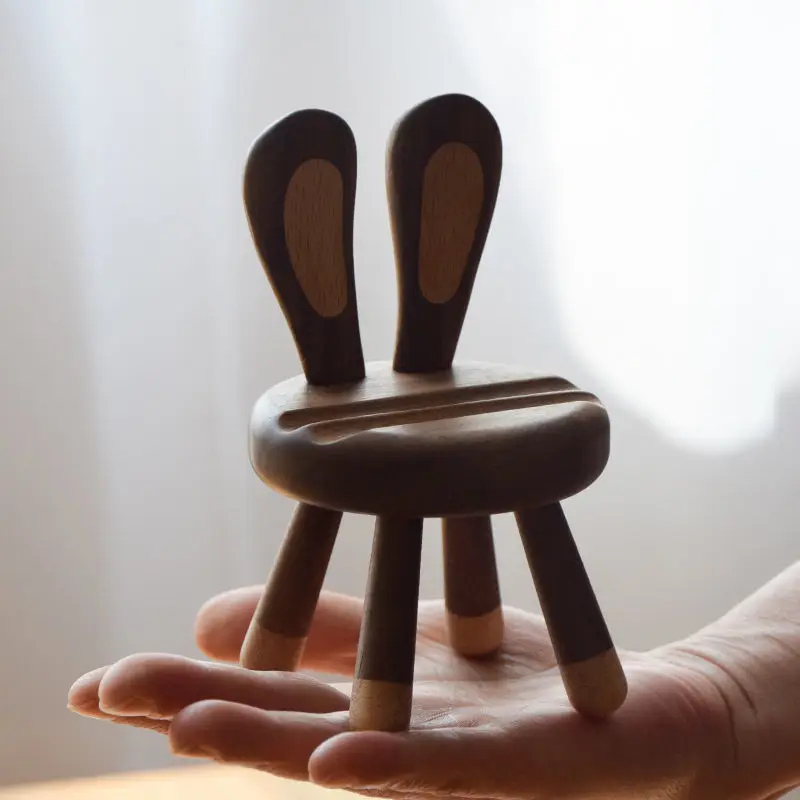 

Rabbit chair mobile phone bracket black walnut creative wood cute tablet desktop mobile phone seat decoration